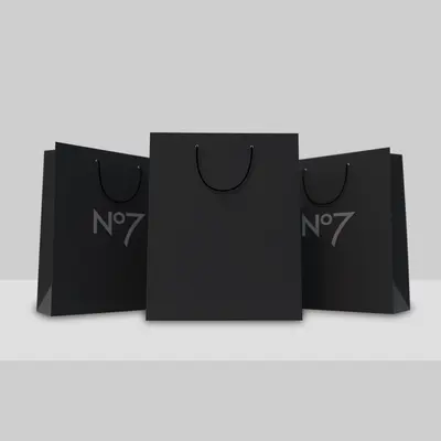Black Paper Bags presented alongside its printed surface detail