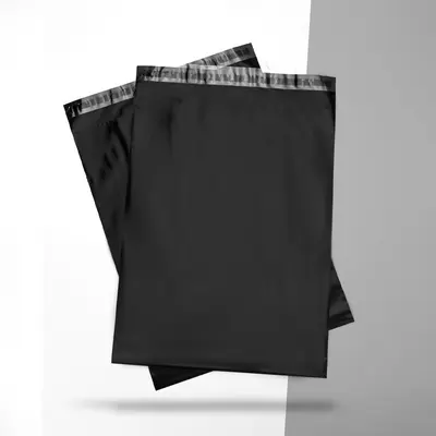 Black Poly Mailers photographed from a second angle showing the side panel