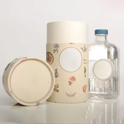 Bottle Tube Packaging photographed from a second angle showing the side panel