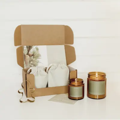 Candle Subscription Boxes shown in a retail presentation setting