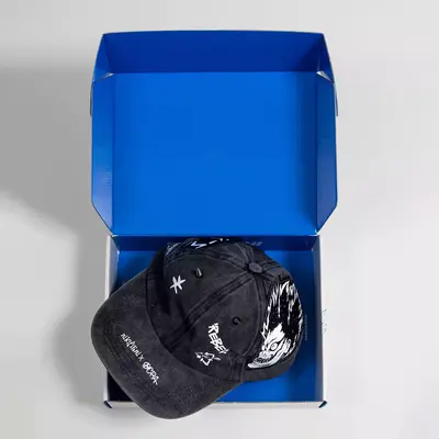 Cap Boxes presented alongside its printed surface detail