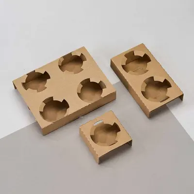 Cardboard Cup Holder presented alongside its printed surface detail