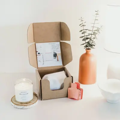Custom Candle Boxes with Inserts presented alongside its printed surface detail