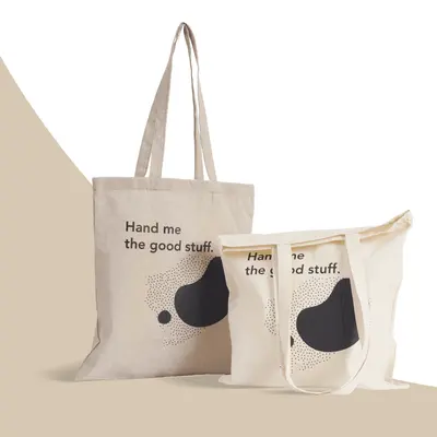 Custom Cotton Tote Bags displayed with the closure detail visible