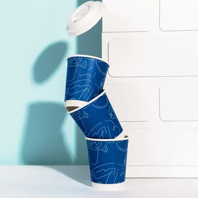 Custom Double Wall Paper Cups photographed from a second angle showing the side panel