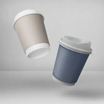 Custom Double Wall Paper Cups photographed to show the finish across the panel