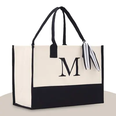 Custom Monogrammed Tote Bags displayed with the closure detail visible