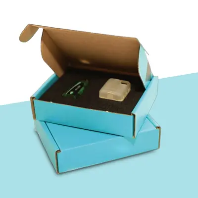 Custom Packaging Boxes with Inserts presented alongside its printed surface detail