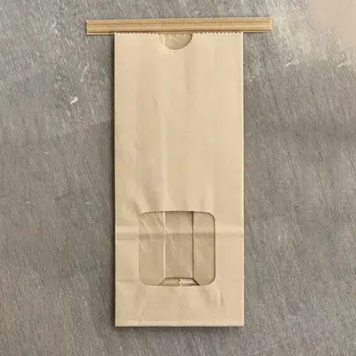 Custom Printed Tin Tie Bags displayed with the closure detail visible