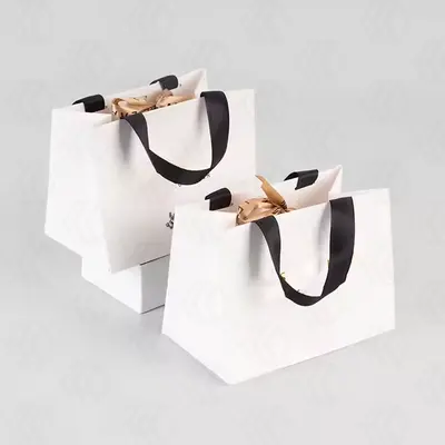 Drawstring Christmas Gift Bags displayed with the closure detail visible