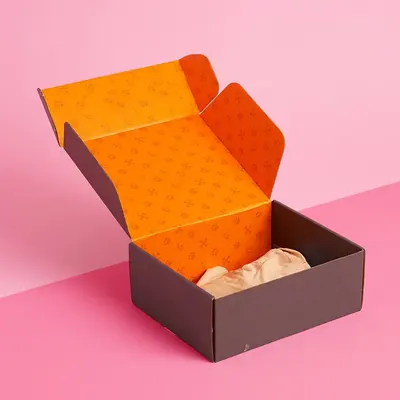 E Commerce Boxes presented alongside its printed surface detail