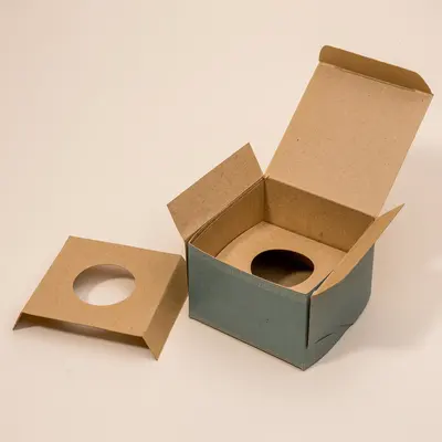 Kraft Boxes with Inserts displayed with the closure detail visible