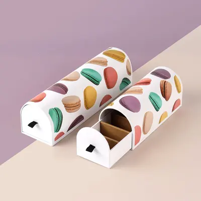 Macaron Boxes presented alongside its printed surface detail