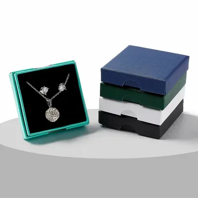Necklace Boxes presented alongside its printed surface detail