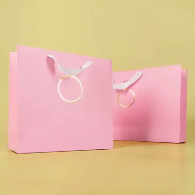 Pink Paper Bags shown at an angle that reveals the depth of the pack