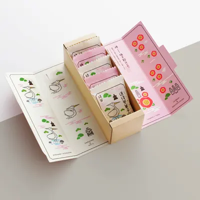 Tea Boxes presented alongside its printed surface detail