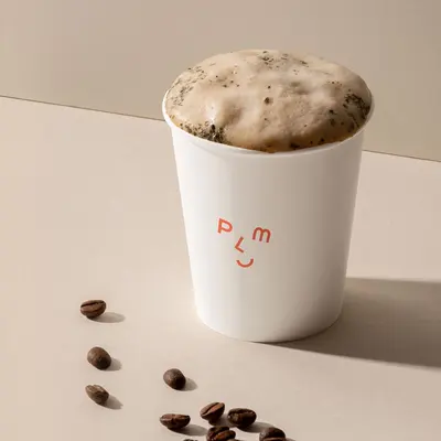 White Paper Cup displayed with the closure detail visible